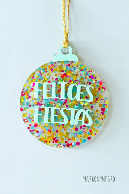 Bola de Navidad de metacrilato Felices Fiestas con confeti multicolor y letras verde menta